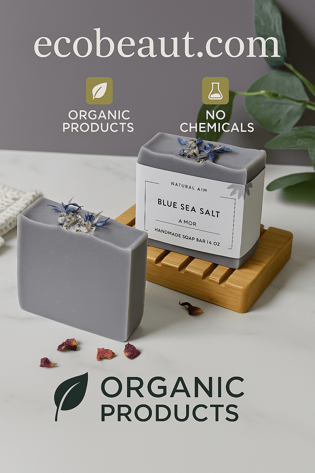 A digital photograph for ecobeaut.com showcases a Blue Sea Salt Amor handmade soap bar with floral accents, presented on a bamboo tray beside another bar, against a soft natural backdrop with organic product labels.