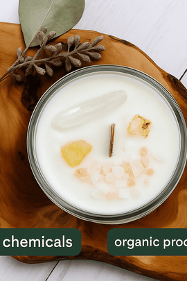 A natural soy candle in a glass jar placed on a wooden board with a eucalyptus leaf and dried flowers, labeled with "no chemicals" and "organic products" in the top right corner with ecobeaut.com branding.