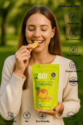 Beautiful presentation of 2GO! Organic Dried Pineapple in a natural setting, with clean design and eco-labels – 'Handmade', 'No Chemicals', 'Eco-Friendly', 'Organic Product', 'Made in USA', and ecobeaut.com in top right corner