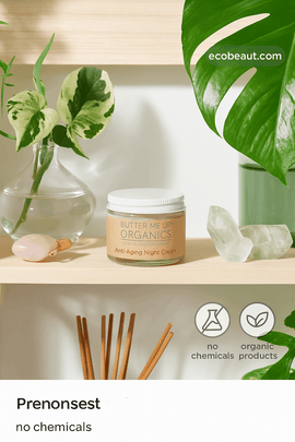 Butter Me Up Organics Anti-Aging Night Cream on wooden shelf with crystals, green leaves, and natural decor – ecobeaut.com, no chemicals, organic products