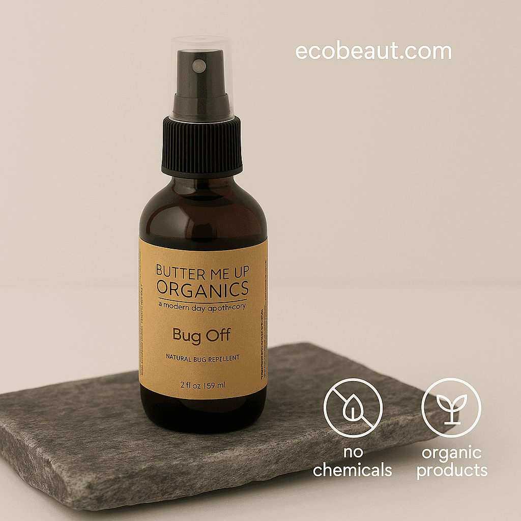 Butter Me Up Organics Bug Off spray bottle placed on a flat stone slab with a beige background, featuring “no chemicals,” “organic products” icons and ecobeaut.com in the top right corner.