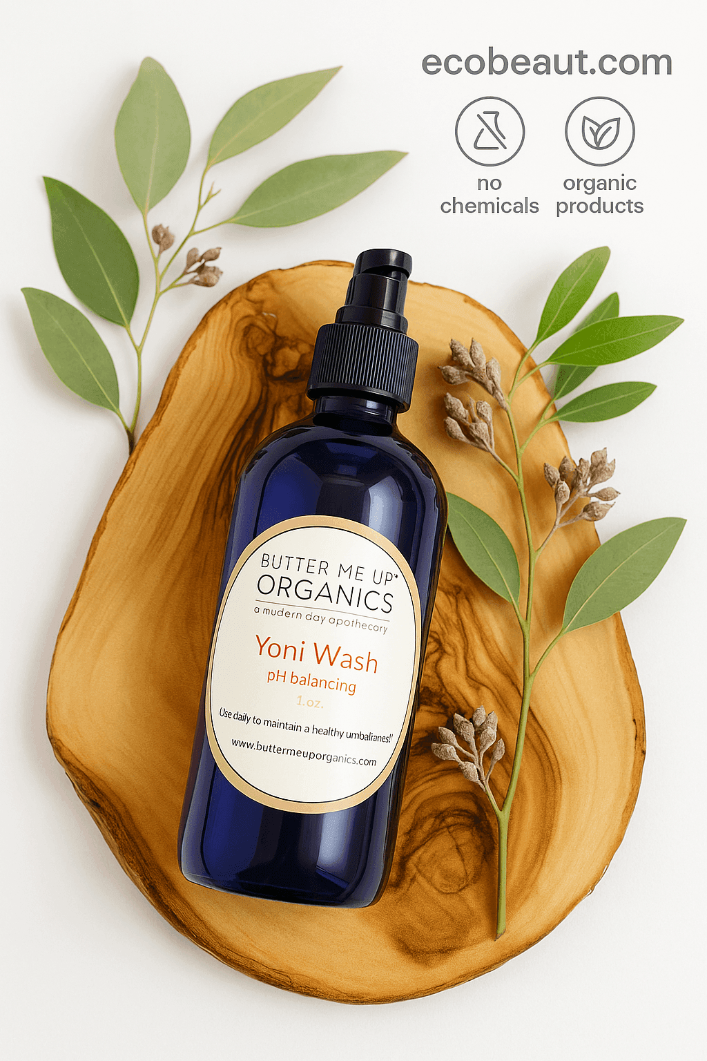 Butter Me Up Organics Yoni Wash bottle by ecobeaut.com on a wooden slab with green leaves, featuring “NO CHEMICALS” and “ORGANIC PRODUCTS” icons in the top right corner.
