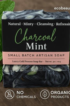 Charcoal Mint artisan soap on wood with mint leaves, eco labels, and ecobeaut.com in the top corner.