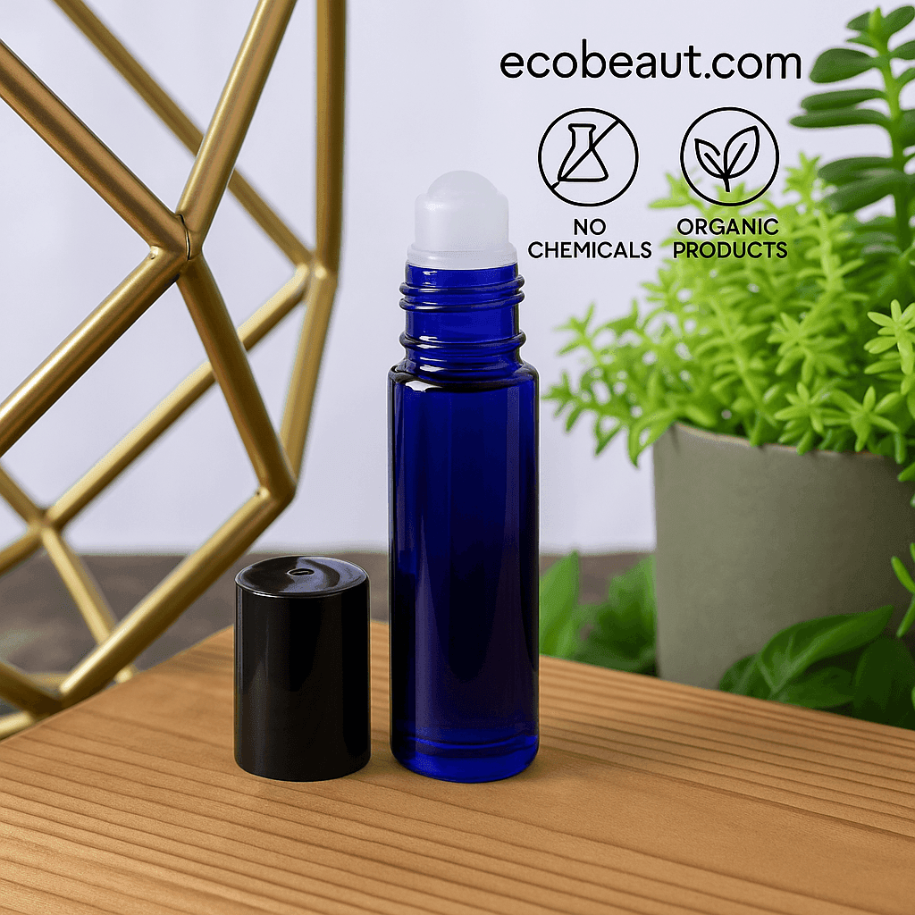 "Custom perfume oil in a cobalt blue roll-on bottle with black cap, placed on a wooden surface, decorated with lush green plants and eco labels 'no chemicals', 'organic products', and ecobeaut.com branding in the top right corner."