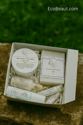 EcoBeaut.com organic skincare gift set with Summer Garden sugar scrub, Lavender Mint Splash soap, bath salts, and lip balms in white box on natural stone background