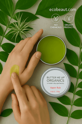 "Fair-skinned woman applying green vapor rub to back of hand from an open tin, surrounded by green leaves, eco labels, and ecobeaut.com branding in the top right corner."