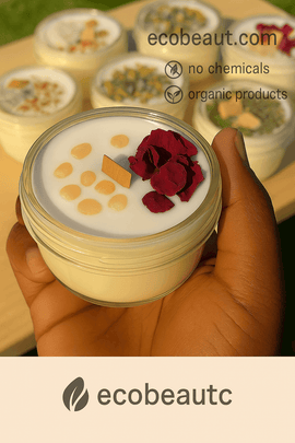 Hand holding an organic soy wax candle with crystals and botanicals – Butter Me Up Organics Grief Candle, eco-friendly and chemical-free