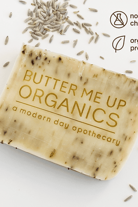 Handcrafted dark wood soap dish on neutral fabric with eucalyptus leaves, featuring ecobeaut.com branding – organic skincare accessories USA