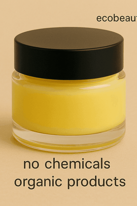 Minimalist close-up of a glass jar with yellow organic cream and black lid on a beige background, with “ecobeaut.com” in the top right and “no chemicals” and “organic products” written below.