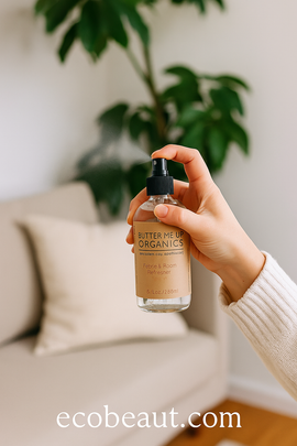 Hand holding a bottle of 'Buttermilk Organics' product with a blurred indoor setting