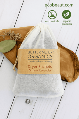 Organic Lavender Dryer Sachets by Butter Me Up Organics placed on natural wood background with dried leaves – eco-friendly, chemical-free fabric freshener, available at ecobeaut.com