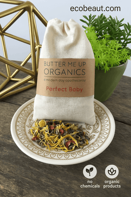 Organic Sitz Tea loose herbal blend with chamomile, rose petals, and calendula on a neutral background – ecobeaut.com