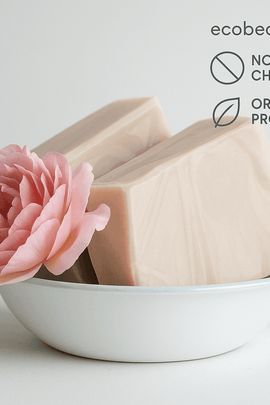 Passion Flower Shampoo Bar with a pink flower in a white bowl, labeled ecobeaut.com, No Chemicals, Organic Products in the top right corner.