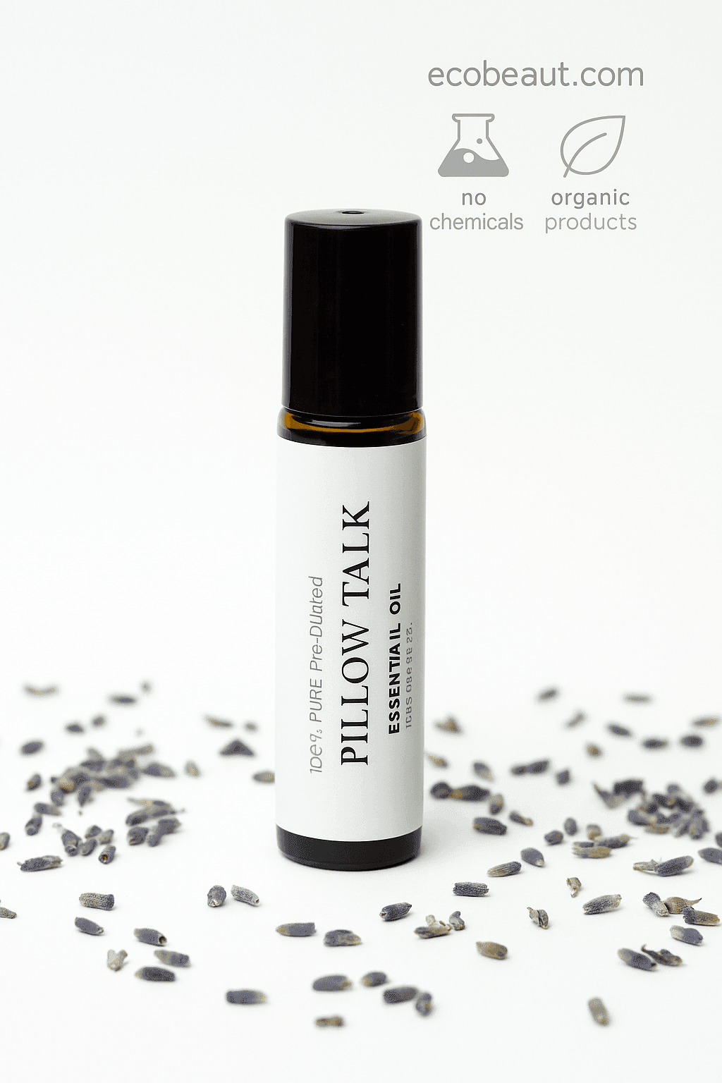 "Pillow Talk essential oil roll-on bottle on white surface, surrounded by scattered lavender buds, with eco-friendly icons and ecobeaut.com branding in the top right corner."