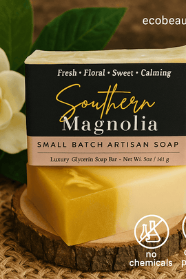 Southern Magnolia small batch artisan soap by ecobeaut.com displayed on a rustic wooden slice with magnolia flowers and eco-labels “no chemicals” and “organic products” in the upper right corner.
