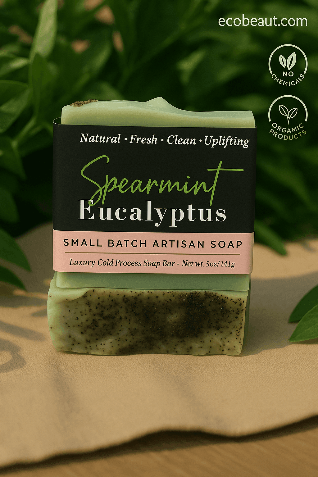 Spearmint Eucalyptus soap bar by ecobeaut.com displayed on beige linen with green leaves in the background, featuring “NO CHEMICALS” and “ORGANIC PRODUCTS” icons in the upper right corner.