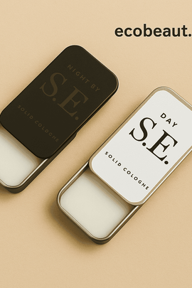 Two tins of S.E. Solid Cologne labeled DAY and NIGHT on a beige background with ecobeaut.com – minimalist organic fragrance for men.