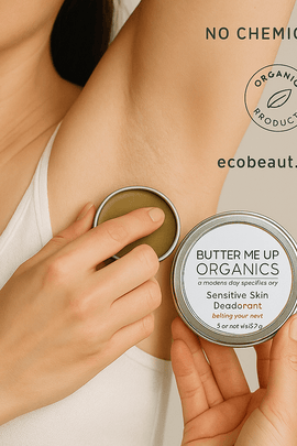 Woman applying Butter Me Up Organics deodorant under her arm, holding the tin with visible eco-friendly labels and ecobeaut.com text.
