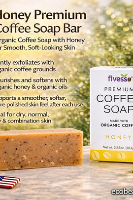 Honey Premium Coffee Soap Bar with packaging on a wooden surface with blurred greenery in the background.