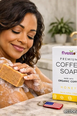 Woman applying fiveso coffee soap to her skin with a box of fiveso coffee soap in the foreground.