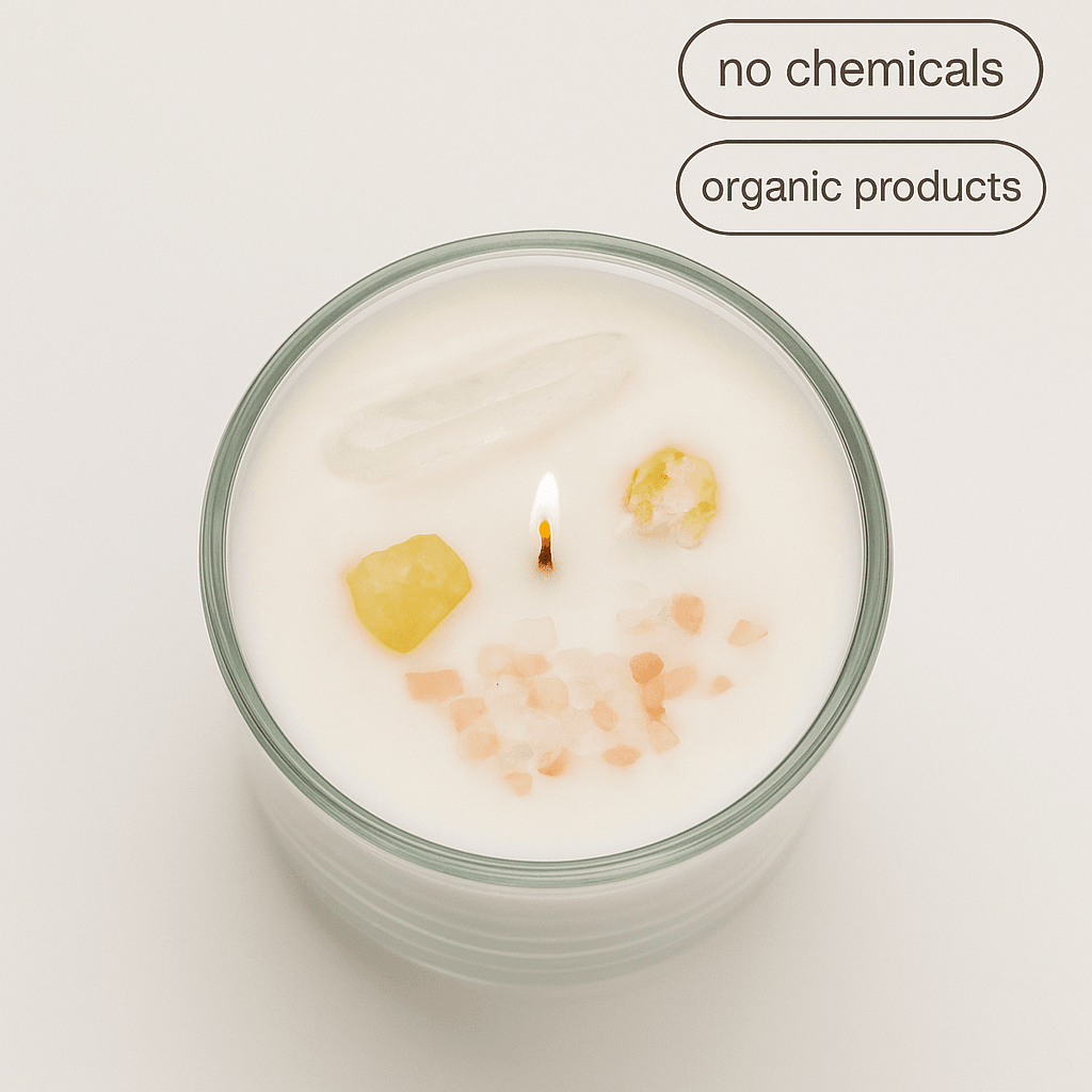 A close-up top view of a lit organic soy candle with crystal and salt inclusions on a white background, featuring "no chemicals" and "organic products" labels in the top right corner.
