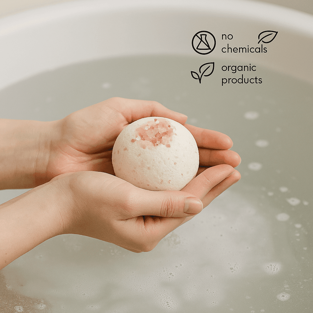 Hand holding a bath bomb with 'no chemicals, organic products' text and icons.