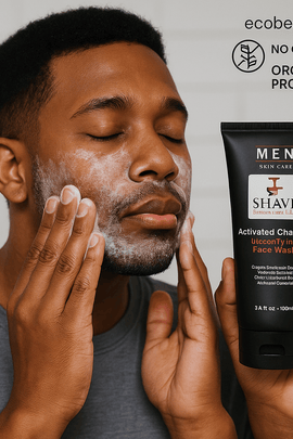 African American man applying SHAVE Essentials Activated Charcoal Face Wash, demonstrating real-life use of this detoxifying natural skincare product for men.