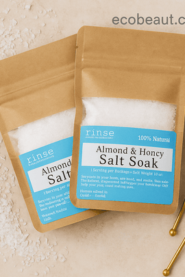 Almond and Honey Salt Soak in kraft pouches on natural background with honey dippers – handmade bath salt from ecobeaut.com