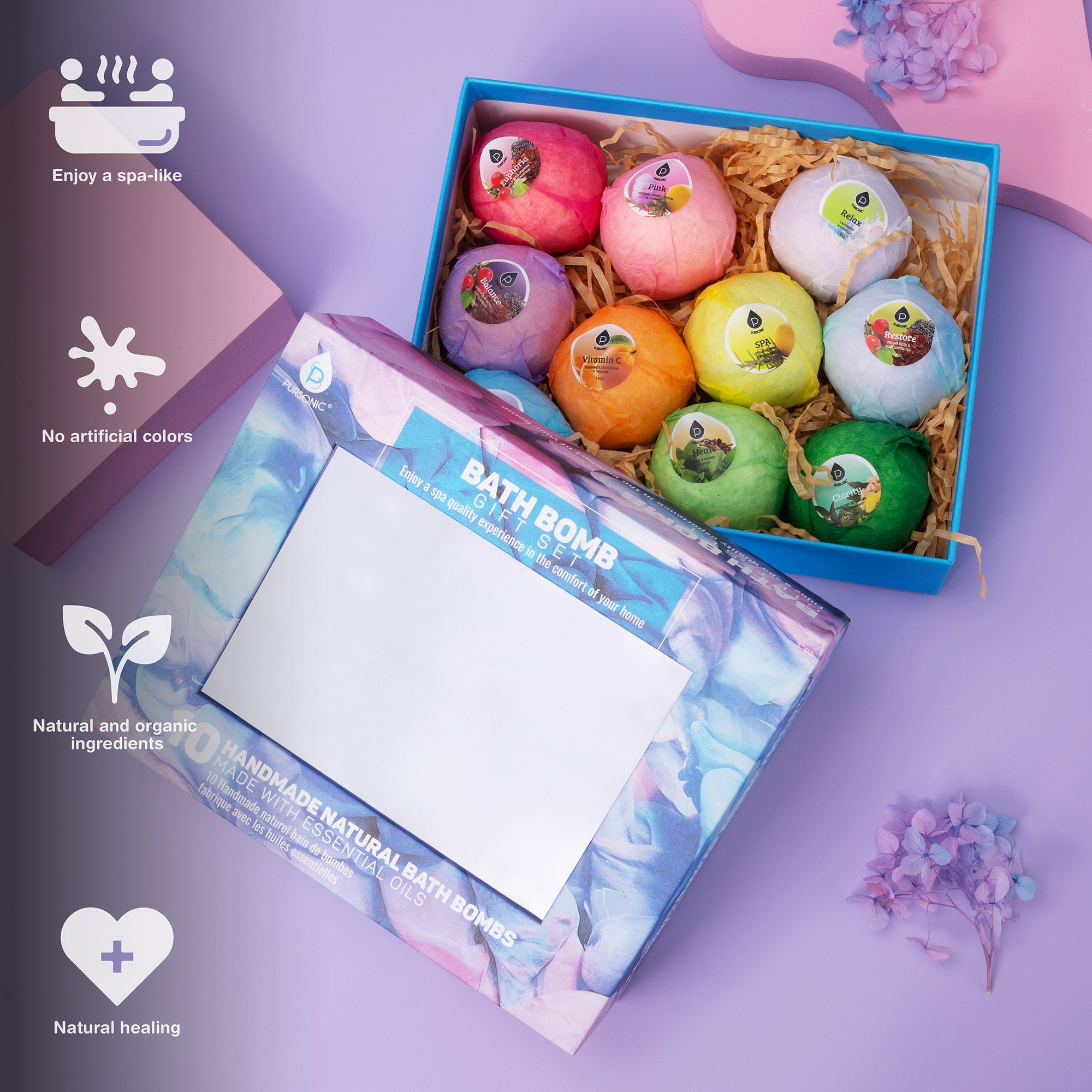 Colorful bath bombs in a box with a decorative card on a purple background