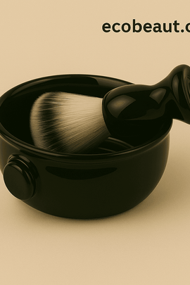 Black ceramic shaving bowl with soft-bristled brush on beige background featuring ecobeaut.com – minimalist product display.