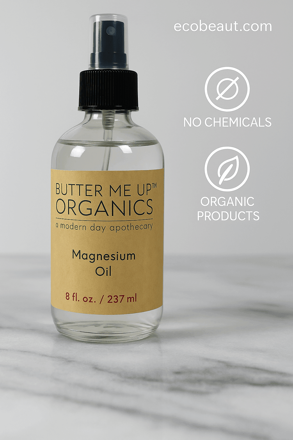 Butter Me Up Organics Magnesium Oil spray bottle displayed on a marble surface with a plain gray background, featuring eco-labels "no chemicals" and "organic products" and ecobeaut.com in the top right corner.

