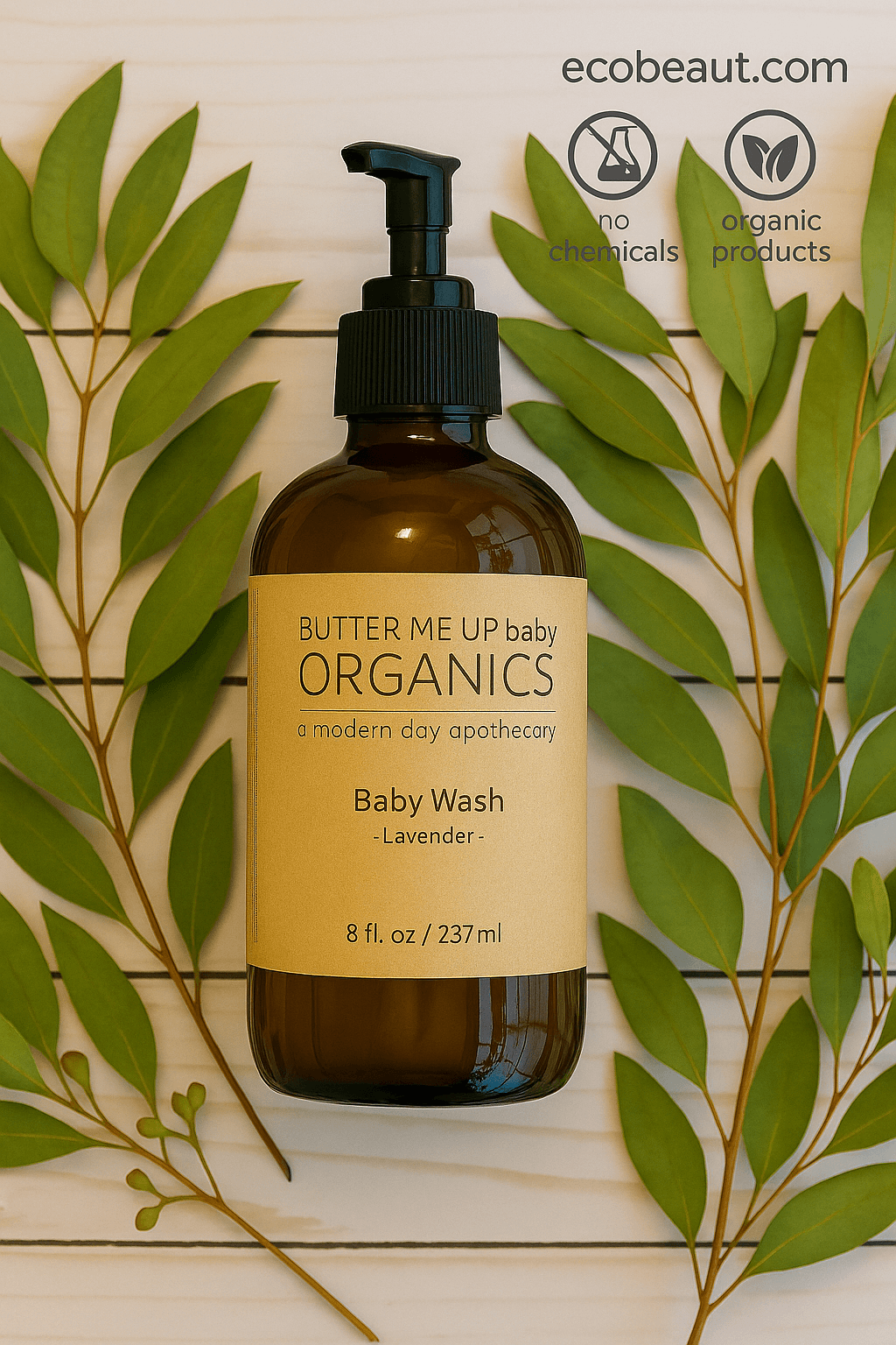 Butter Me Up Baby Organics baby wash bottle with green leaves on a wooden background