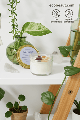 Butter Me Up Organics Grief Candle with dried flowers and Himalayan salt – hand-poured soy wax, intention candle on shelf with plants