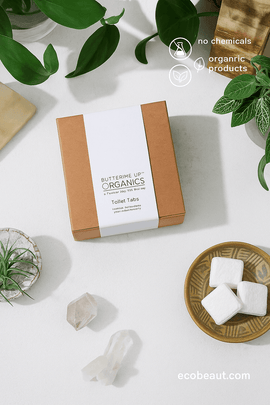 Butter Me Up Organics Toilet Tabs in kraft box surrounded by plants and crystals – eco-friendly toilet cleaner, chemical-free and organic

