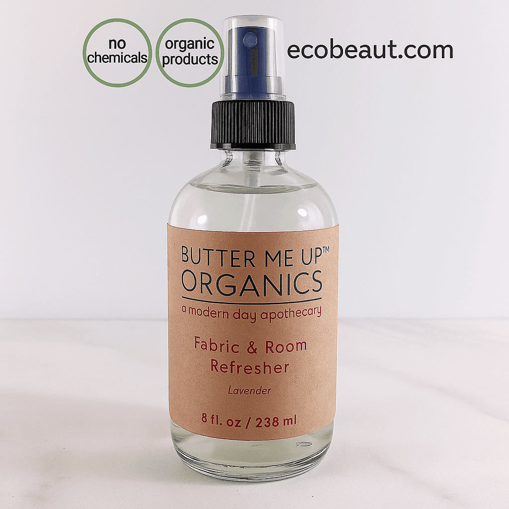 Butter Me Up Organics lavender fabric and room refresher spray bottle displayed on a marble surface with fresh lavender – natural home scent product made in the USA