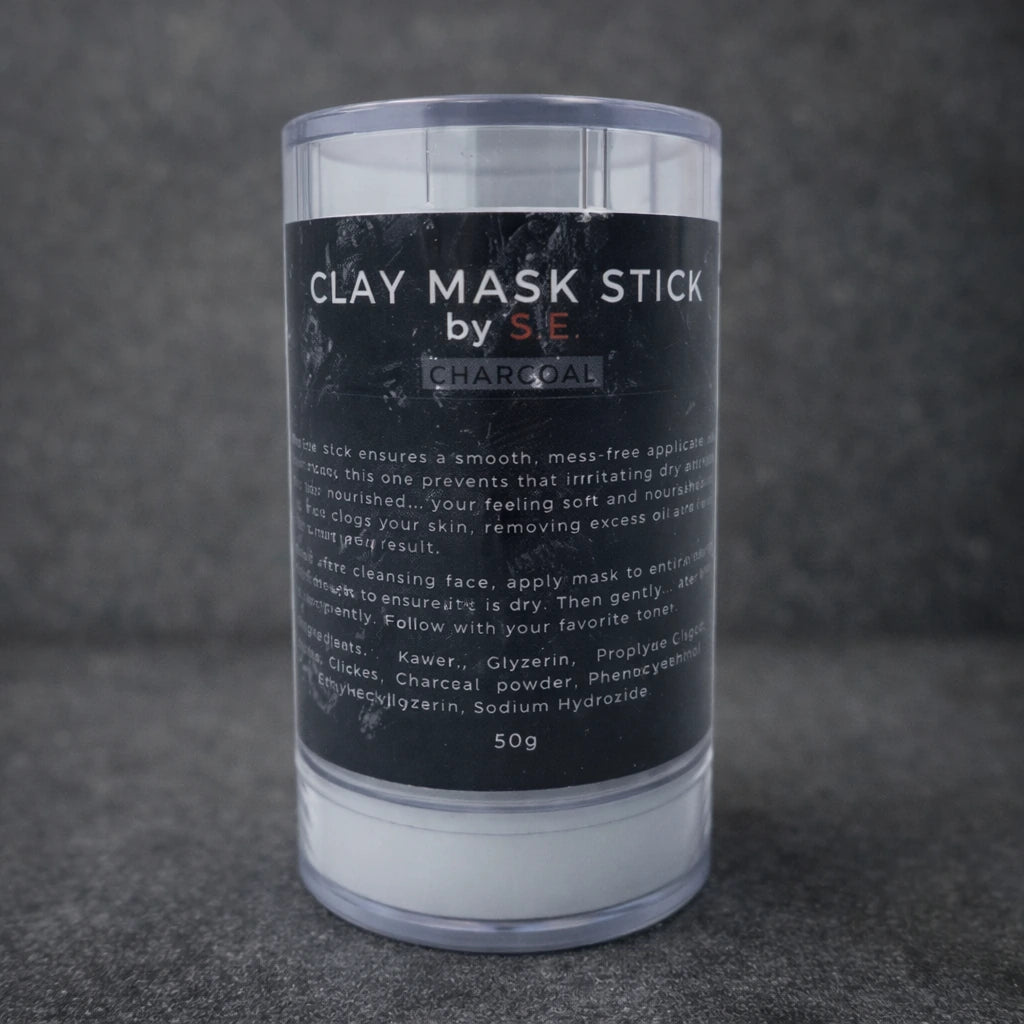 Clay mask stick with black label on a dark textured background