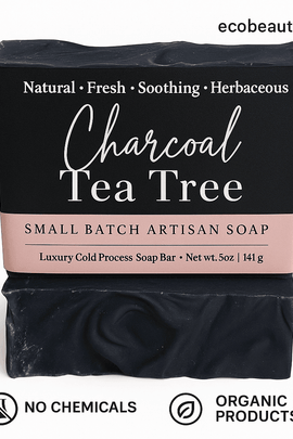 Charcoal Tea Tree artisan soap with a black and pink label, set against a white background. 'ecobeaut.com' is in the top right, and eco-labels 'NO CHEMICALS' and 'ORGANIC PRODUCTS' are displayed at the bottom.