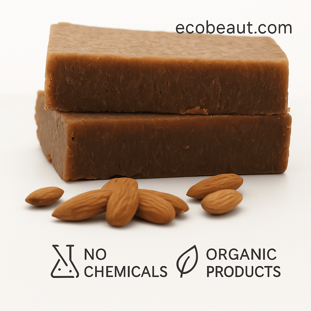 Cinnamon Honey and Almond Soap bars stacked on a white background with whole almonds in front. The image includes the website ecobeaut.com in the top right corner and eco labels 'NO CHEMICALS' and 'ORGANIC PRODUCTS' at the bottom.