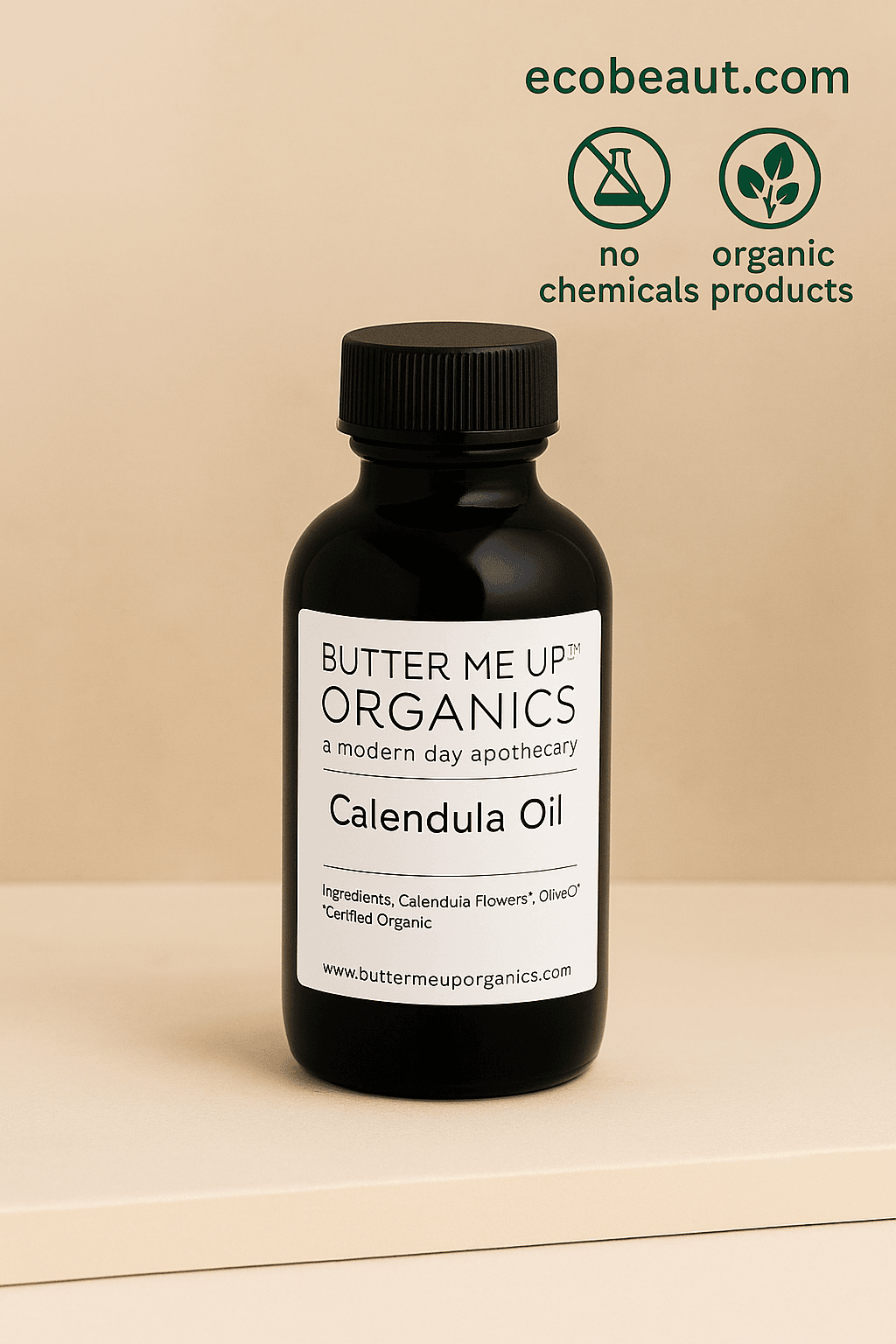 Close-up of Butter Me Up Organics Calendula Oil in a dark amber glass bottle with a white label, placed on a smooth beige surface with ecobeaut.com, no chemicals, and organic products icons in the top right corner








