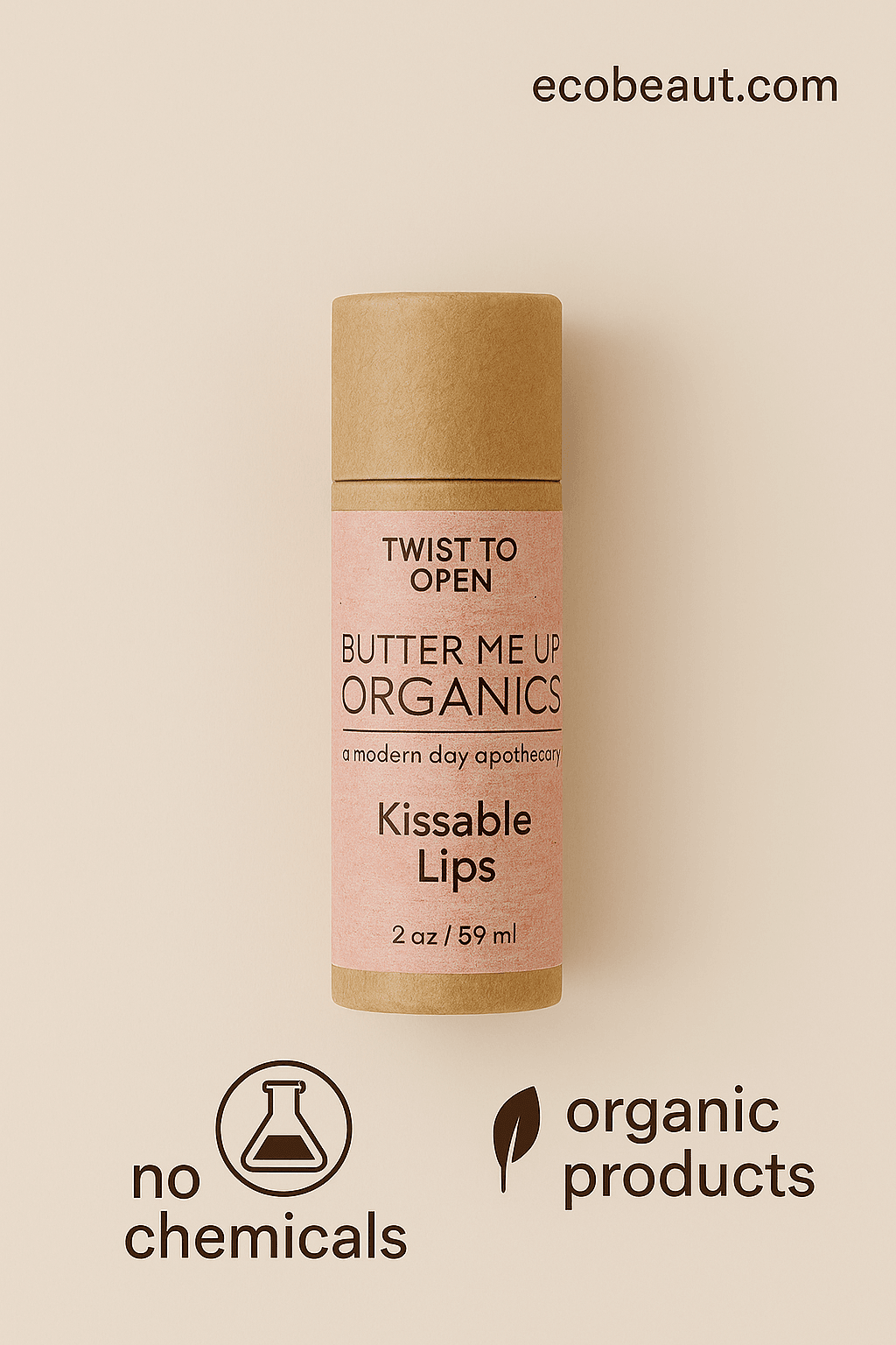Close-up of Butter Me Up Organics “Kissable Lips” lip balm in kraft paper packaging with a soft pink label, placed on a clean beige background. The website “ecobeaut.com” is in the top right corner, and eco-icons “no chemicals” and “organic products” are neatly arranged at the bottom right.
