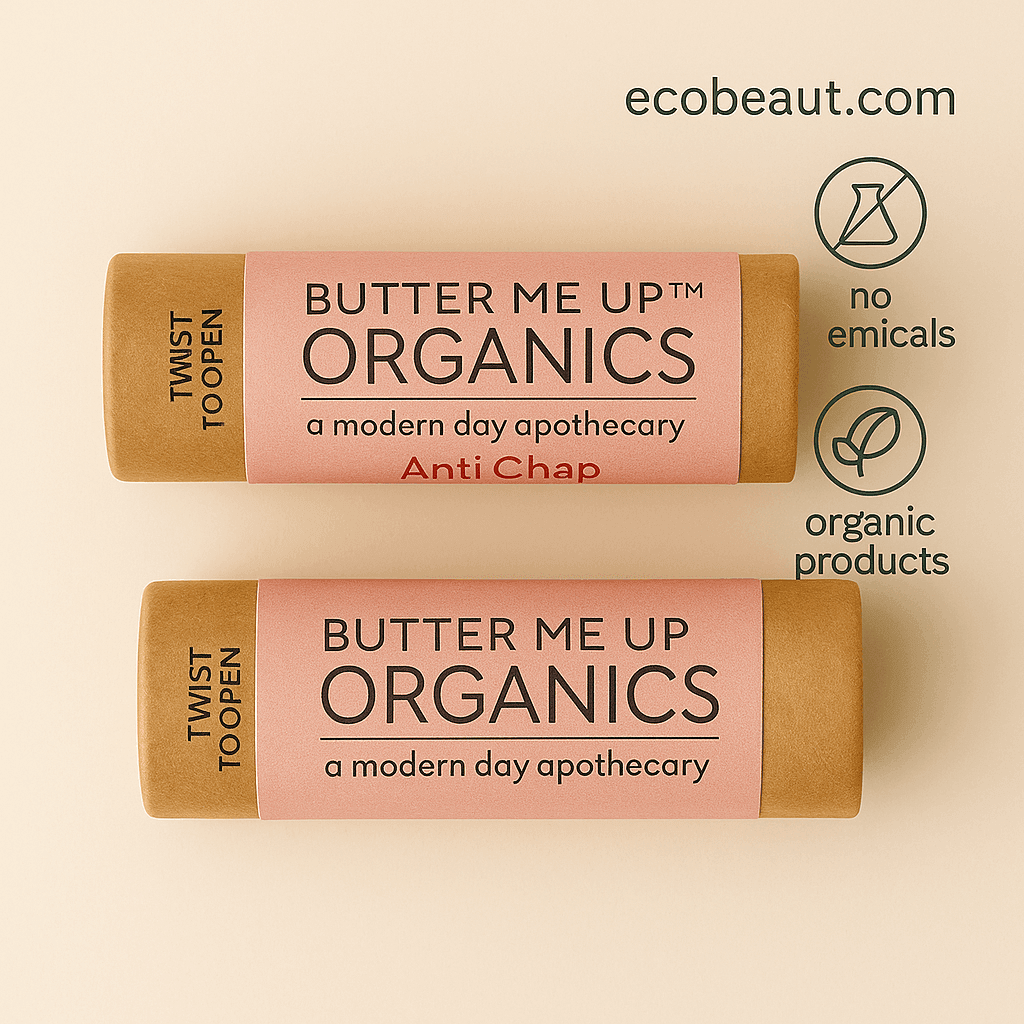 Close-up of Butter Me Up™ Organics lip balm on a neutral background with ecobeaut.com, no chemicals, and organic products labels in the top right corner, showcasing eco-friendly packaging and natural ingredients