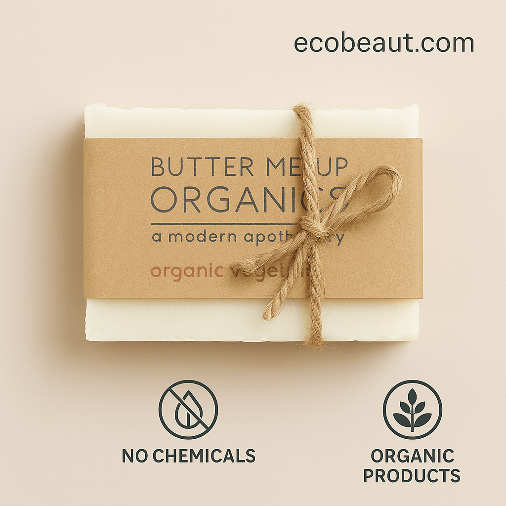 Bar of soap with a brown paper label on a beige background, featuring the brand 'Butter Me Up Organics'.