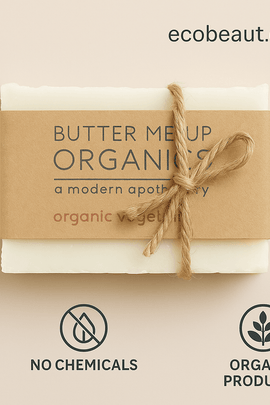 Bar of soap with a brown paper label on a beige background, featuring the brand 'Butter Me Up Organics'.