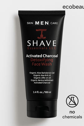 Close-up of SHAVE Essentials Activated Charcoal Face Wash tube on white background with 'no chemicals' and 'organic products' icons and ecobeaut.com branding.