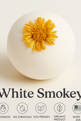 Close-up of White Smokey handmade organic bath bomb with marigold petals – eco-friendly, no chemicals, made in USA – ecobeaut.com