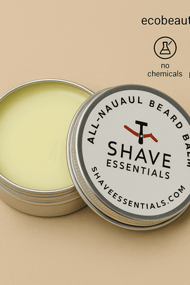 Close-up of an open tin of Shave Essentials All-Natural Beard Balm on a beige background, showing creamy balm texture and labeled lid, with ecobeaut.com and eco-friendly icons above.