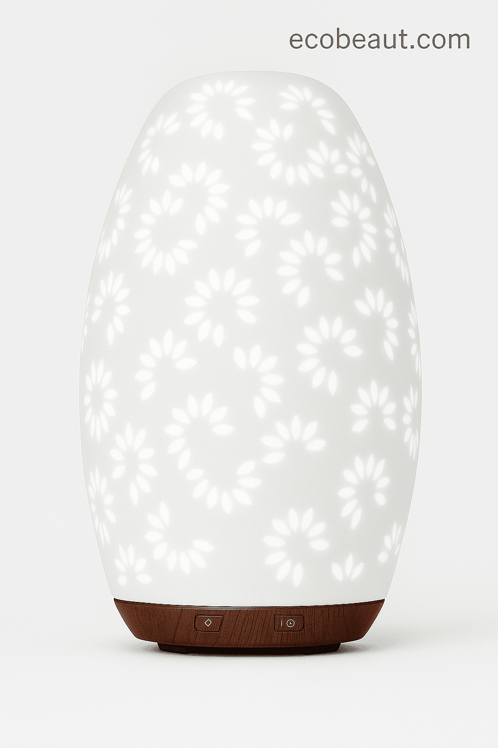 Close-up of daisy ceramic essential oil diffuser with wood grain base and glowing flower cutouts on white background, ecobeaut.com in top corner