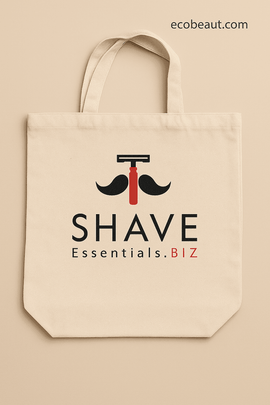 Close-up of eco-friendly SHAVE Essentials.BIZ cotton tote bag – organic beige bag with mustache and razor print, perfect for sustainable skincare kits – ecobeaut.com branding