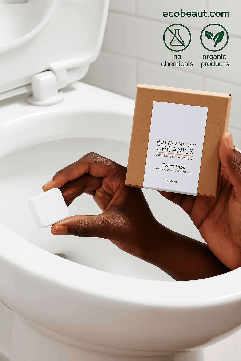 Dark-skinned hand using Butter Me Up Organics Toilet Tabs – natural fizzing tablet held near toilet, plastic-free and non-toxic cleaner