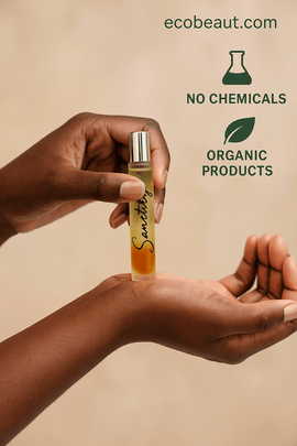 Sanctify Rollerball Perfume - Palo Santo, Bergamot, Patchouli & Cedarwood held in hand, showcasing organic products.